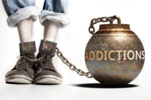 Addictions,Can,Be,A,Big,Weight,And,A,Burden,With L'addiction est une entrave qui empêche de vivre pleinement.